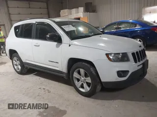2012 Jeep Compass Latitude with VIN 1C4NJDEB0CD676725, listed as a IAAI auction lot 41948874 with 143,833 mi miles. Bid and sale history available at carsss.com. Image 1.