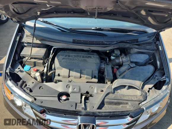 2014 Honda Odyssey EX-L with VIN 5FNRL5H63EB036388, listed as a Copart auction lot 65701425 with 117,636 mi miles and Clean title. Bid and sale history available at DreamBid. Image 12.
