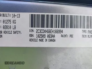 2014 Dodge Charger SXT with VIN 2C3CDXHG6EH166994, listed as a IAAI auction lot 41801739 with 163,314 mi miles. Bid and sale history available at carsss.com. Image 9.