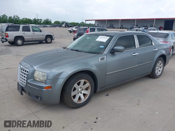 2006 Chrysler 300 Touring z VIN 2C3KA53G26H258427, wystawiony jako IAAI lot #42449071 z przebiegiem 152 223 mil mil oraz . Historia ofert i sprzedaży dostępna na DreamBid. Obrazek 2.