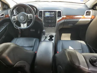 2012 Jeep Grand Cherokee Limited z VIN 1C4RJFBT0CC287342, wystawiony jako Copart lot #57000525 z przebiegiem 135 655 mil mil oraz Szkoda całkowita • Salvage title. Historia ofert i sprzedaży dostępna na DreamBid. Obrazek 8.