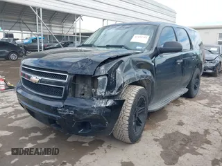 2011 Chevrolet Tahoe Commercial with VIN 1GNLC2E00BR325388, listed as a IAAI auction lot 41472731 with 265,781 mi miles and . Bid and sale history available at DreamBid. Image 18.
