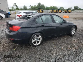 2013 BMW 3 Series 328i xDrive with VIN WBA3B5C53DF595177, listed as a Copart auction lot 57024375 with 124,873 mi miles and Salvage title. Bid and sale history available at DreamBid. Image 3.