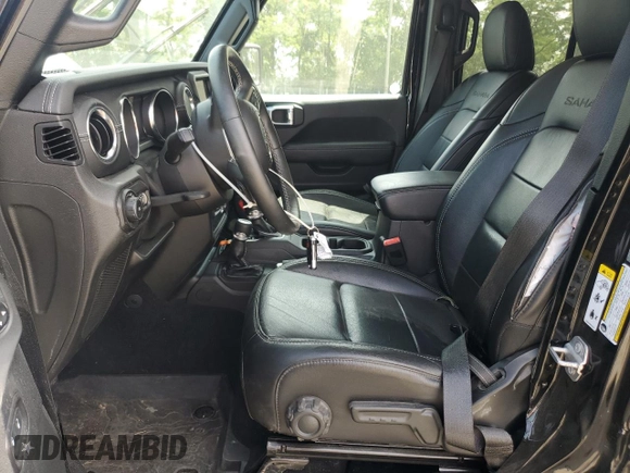 2019 Jeep Wrangler Unlimited Sahara with VIN 1C4HJXEN5KW523978, listed as a Copart auction lot 60188735 with 21,937 mi miles and Salvage title. Bid and sale history available at DreamBid. Image 7.