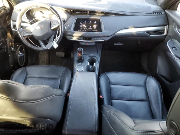 2020 Cadillac XT4 AWD Premium Luxury with VIN 1GYFZDR49LF032597, listed as a Copart auction lot 88595595 with 82,324 mi miles and Salvage title. Bid and sale history available at DreamBid. Image 8.