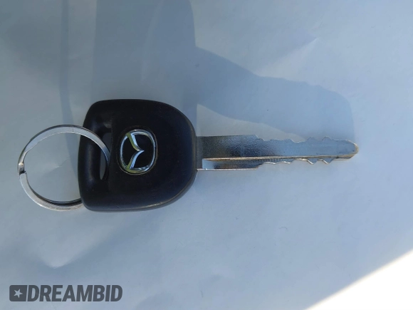2013 Mazda 3 i SV with VIN JM1BL1TG3D1811032, listed as a IAAI auction lot 41603113 with 125,610 mi miles and . Bid and sale history available at DreamBid. Image 11.