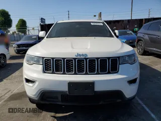 2021 Jeep Grand Cherokee Laredo E with VIN 1C4RJEAGXMC719497, listed as a Copart auction lot 60830315 with 3,873 mi miles and Salvage title. Bid and sale history available at DreamBid. Image 5.