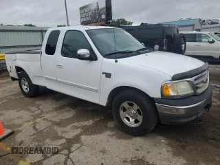 2002 Ford F-150 XL with VIN 1FTRX17L52KC49698, listed as a Copart auction lot 54307145 with 254,394 mi miles and Salvage title. Bid and sale history available at DreamBid. Image 4.