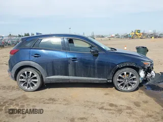 2019 Mazda CX-3 Touring z VIN JM1DKFC78K1416219, wystawiony jako IAAI lot #41761329 z przebiegiem 52 172 mil mil oraz . Historia ofert i sprzedaży dostępna na DreamBid. Obrazek 13.