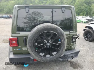 2023 Jeep Wrangler Sahara z VIN 1C4JJXP62PW553101, wystawiony jako Copart lot #56935165 z przebiegiem 28 157 mil mil oraz Szkoda całkowita • Salvage title. Historia ofert i sprzedaży dostępna na DreamBid. Obrazek 6.