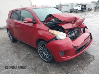 2013 Scion xD with VIN JTKKUPB43D1035677, listed as a IAAI auction lot 41898740 with 96,000 mi miles. Bid and sale history available at carsss.com. Image 1.