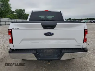 2020 Ford F-150 XL with VIN 1FTEW1E43LKD42136, listed as a Copart auction lot 59444145 with 142,294 mi miles and Salvage title. Bid and sale history available at DreamBid. Image 6.