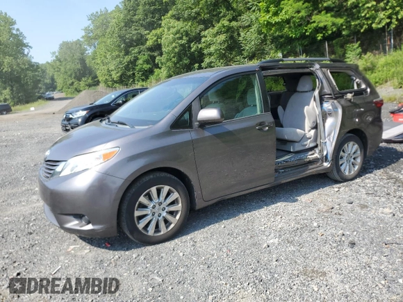 2015 Toyota Sienna LE with VIN 5TDJK3DC0FS112243, listed as a Copart auction lot 61791405 with 86,039 mi miles and Salvage title. Bid and sale history available at DreamBid. Image 1.