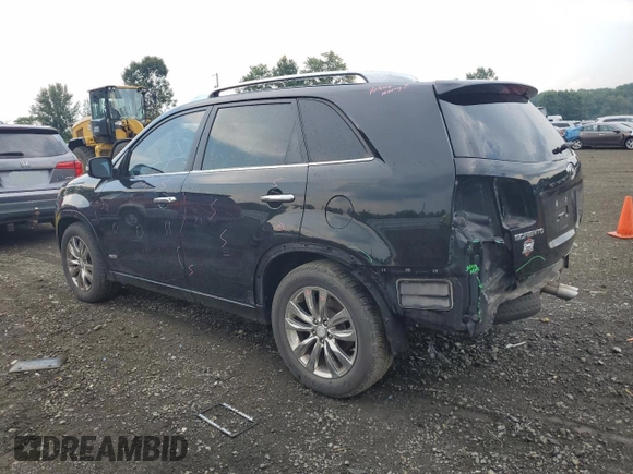 2012 Kia Sorento SX with VIN 5XYKWDA2XCG306782, listed as a Copart auction lot 65626604 with 137,060 mi miles and Salvage Title. Bid and sale history available at carsss.com. Image 2.
