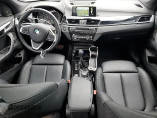 2016 BMW X1 xDrive28i z VIN WBXHT3C30G5E54396, wystawiony jako Copart lot #56042815 z przebiegiem 101 632 mil mil oraz Szkoda całkowita • Salvage title. Historia ofert i sprzedaży dostępna na DreamBid. Obrazek 8.