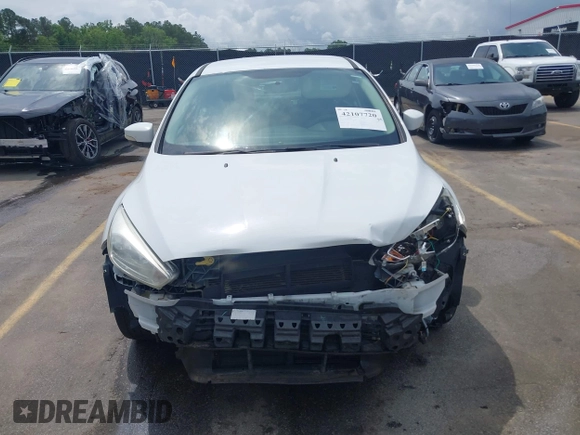 2015 Ford Focus SE with VIN 1FADP3F28FL204145, listed as a IAAI auction lot 42107720 with 129,441 mi miles and . Bid and sale history available at DreamBid. Image 13.