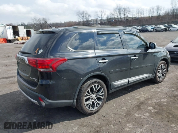 2016 Mitsubishi Outlander SE with VIN JA4AD3A39GZ003885, listed as a IAAI auction lot 41869646 with 193,320 mi miles and . Bid and sale history available at DreamBid. Image 4.