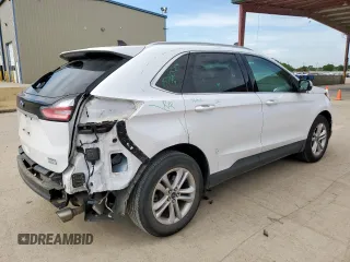 2020 Ford Edge SEL с VIN 2FMPK3J93LBB16928, выставлен на аукционе Copart как лот 63030385 с пробегом 81 567 миль миль и Чистый • Clean title. История ставок и продаж доступна на DreamBid. Изображение 3.