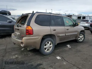 2002 GMC Envoy SLT with VIN 1GKDT13SX22353269, listed as a Copart auction lot 45421375 with 212,027 mi miles and Salvage Title. Bid and sale history available at carsss.com. Image 3.