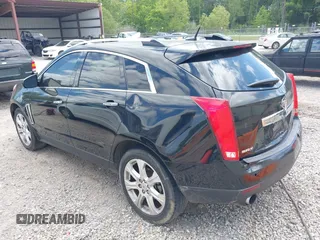 2013 Cadillac SRX Performance Collection z VIN 3GYFNDE35DS555248, wystawiony jako IAAI lot #42001494 z przebiegiem 268 410 mil mil oraz . Historia ofert i sprzedaży dostępna na DreamBid. Obrazek 3.
