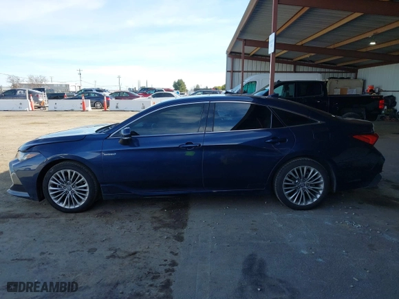 2019 Toyota Avalon Hybrid Limited with VIN 4T1B21FB5KU007633, listed as a IAAI auction lot 41615161 with 132,182 mi miles. Bid and sale history available at carsss.com. Image 14.