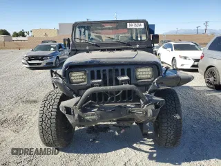 1995 Jeep Wrangler S with VIN 1J4FY19P7SP209782, listed as a Copart auction lot 84476294 with 157,029 mi miles and Salvage Title. Bid and sale history available at carsss.com. Image 5.