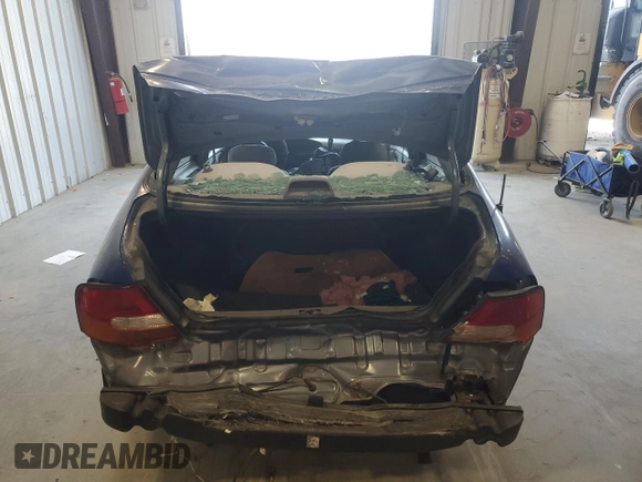 1999 Nissan Altima XE z VIN 1N4DL01D9XC148205, wystawiony jako Copart lot #50392305 z przebiegiem 90 698 mil mil oraz Szkoda całkowita • Salvage title. Historia ofert i sprzedaży dostępna na DreamBid. Obrazek 6.