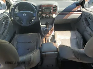 2004 Suzuki XL7 LX z VIN JS3TY92V144105911, wystawiony jako Copart lot #56744425 z przebiegiem 253 975 mil mil oraz Szkoda całkowita • Salvage title. Historia ofert i sprzedaży dostępna na DreamBid. Obrazek 8.