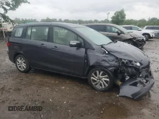 2015 Mazda 5 Sport with VIN JM1CW2BL2F0182775, listed as a Copart auction lot 56796415 with 95,662 mi miles and Salvage title. Bid and sale history available at DreamBid. Image 4.