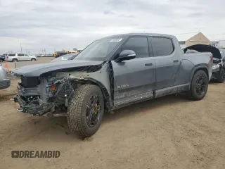 2023 Rivian R1T Adventure with VIN 7FCTGAAA3PN000801, listed as a Copart auction lot 51600895 with 19,486 mi miles and Salvage Title. Bid and sale history available at carsss.com. Image 1.