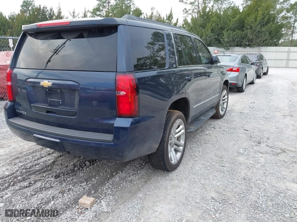 2019 Chevrolet Tahoe LT with VIN 1GNSCBKC7KR133119, listed as a IAAI auction lot 41570650 with 114,575 mi miles. Bid and sale history available at carsss.com. Image 4.