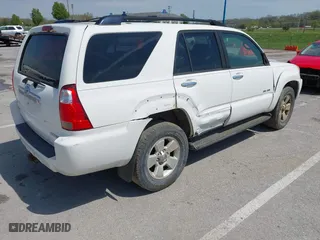 2006 Toyota 4Runner SR5 with VIN JTEBU14R768064604, listed as a IAAI auction lot 42059877 with 166,548 mi miles. Bid and sale history available at carsss.com. Image 4.