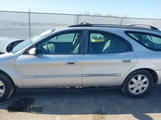 2003 Ford Taurus z VIN 1FAHP59U83A234246, wystawiony jako IAAI lot #41975597 z przebiegiem 178 869 mil mil oraz . Historia ofert i sprzedaży dostępna na DreamBid. Obrazek 14.