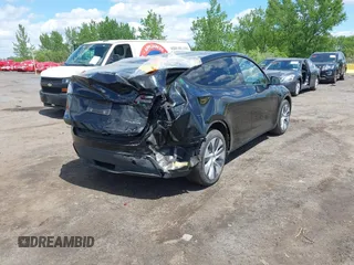 2023 Tesla Model Y Long Range with VIN 7SAYGDEE0PA183891, listed as a IAAI auction lot 42205573 with 41,273 mi miles and . Bid and sale history available at DreamBid. Image 4.