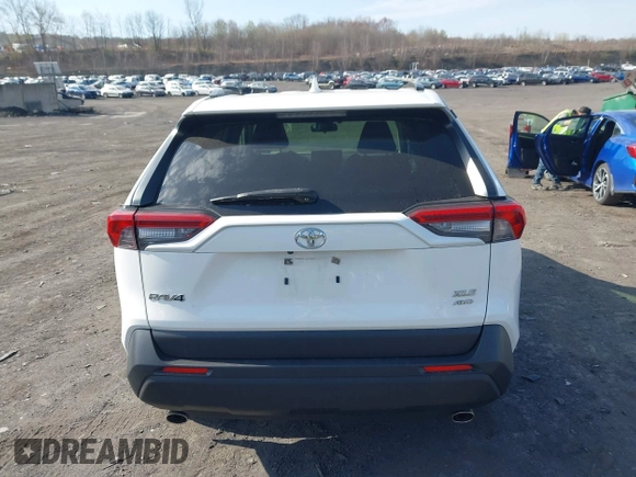 2019 Toyota RAV4 XLE Premium with VIN JTMA1RFV9KD013771, listed as a IAAI auction lot 42055558 with 36,585 mi miles. Bid and sale history available at carsss.com. Image 16.
