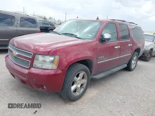 2011 Chevrolet Suburban LT with VIN 1GNSCJE0XBR355603, listed as a IAAI auction lot 42555932 with 240,213 mi miles and . Bid and sale history available at DreamBid. Image 15.