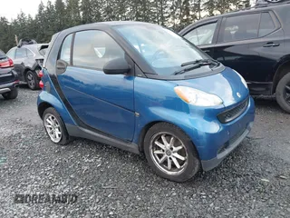 2009 Smart fortwo Pure with VIN WMEEJ31XX9K211922, listed as a IAAI auction lot 41265838 with 106,859 mi miles. Bid and sale history available at carsss.com. Image 1.