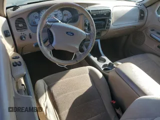 2001 Ford Explorer Sport z VIN 1FMCU70E91UA07153, wystawiony jako Copart lot #64460854 z przebiegiem 149 766 mil mil oraz Szkoda całkowita • Salvage title. Historia ofert i sprzedaży dostępna na DreamBid. Obrazek 8.