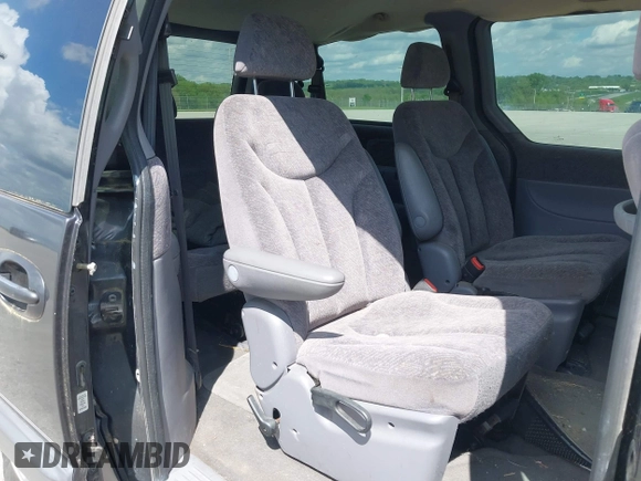 1999 Dodge Grand Caravan with VIN 1B4GP54GXXB897614, listed as a IAAI auction lot 42141997 with 157,698 mi miles and . Bid and sale history available at DreamBid. Image 8.