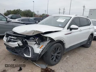 2023 Volkswagen Tiguan SE with VIN 3VVNB7AX8PM099759, listed as a IAAI auction lot 41340885 with 28,562 mi miles and . Bid and sale history available at DreamBid. Image 18.