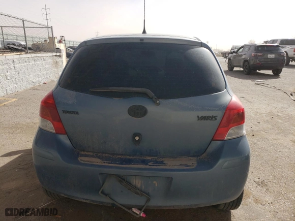 2009 Toyota Yaris with VIN JTDKT903195234291, listed as a Copart auction lot 46946795 with 152,625 mi miles and Salvage Title. Bid and sale history available at carsss.com. Image 6.