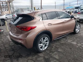 2017 Infiniti QX30 z VIN SJKCH5CP0HA021221, wystawiony jako IAAI lot #41771213 z przebiegiem 88 351 mil mil oraz . Historia ofert i sprzedaży dostępna na DreamBid. Obrazek 4.