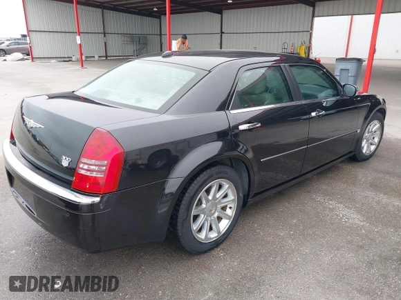 2005 Chrysler 300 with VIN 2C3AA63H45H674987, listed as a IAAI auction lot 41560730 with 101,659 mi miles. Bid and sale history available at carsss.com. Image 4.