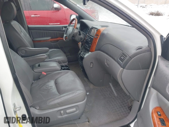 2010 Toyota Sienna XLE z VIN 5TDYK4CC3AS325072, wystawiony jako IAAI lot #41626629 z przebiegiem 145 368 mil mil oraz . Historia ofert i sprzedaży dostępna na DreamBid. Obrazek 5.