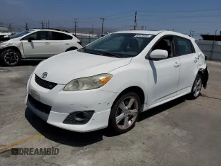 2009 Toyota Matrix S with VIN 2T1KE40E29C020329, listed as a Copart auction lot 60878495 with 104,176 mi miles and Salvage title. Bid and sale history available at DreamBid. Image 1.