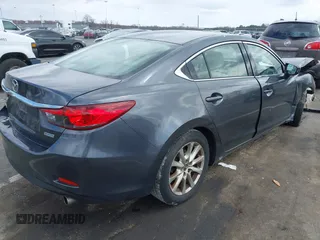 2014 Mazda 6 i Sport with VIN JM1GJ1U51E1111018, listed as a IAAI auction lot 41875461 with 253,755 mi miles and . Bid and sale history available at DreamBid. Image 4.