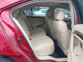 2015 Ford Taurus Limited with VIN 1FAHP2F80FG180450, listed as a IAAI auction lot 42499024 with 127,421 mi miles and . Bid and sale history available at DreamBid. Image 8.