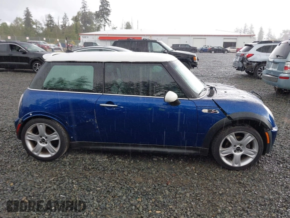 2003 MINI Hardtop S z VIN WMWRE33433TD60388, wystawiony jako IAAI lot #42313209 z przebiegiem 125 869 mil mil oraz . Historia ofert i sprzedaży dostępna na DreamBid. Obrazek 13.