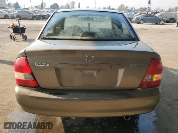 1999 Mazda Protege DX z VIN JM1BJ2223X0137153, wystawiony jako Copart lot #87899735 z przebiegiem 154 209 mil mil oraz Szkoda całkowita • Salvage title. Historia ofert i sprzedaży dostępna na DreamBid. Obrazek 6.