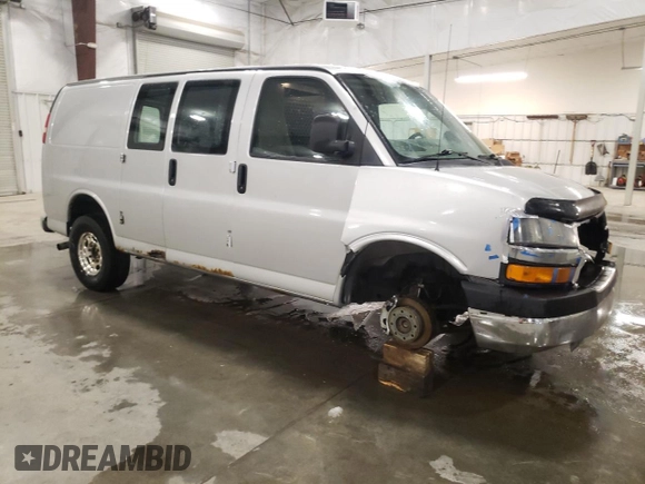 2015 Chevrolet Express Cargo with VIN 1GCWGFCF9F1116132, listed as a Copart auction lot 50924125 with 147,150 mi miles and Salvage title. Bid and sale history available at DreamBid. Image 4.